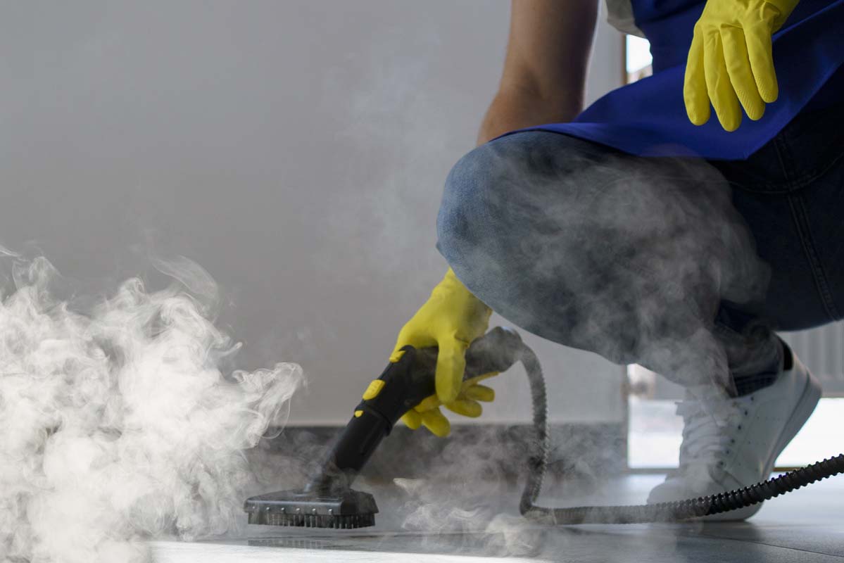 Professional cleaner tidying a living room