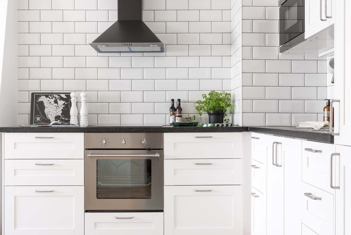 Clean white tile grout after scrubbing