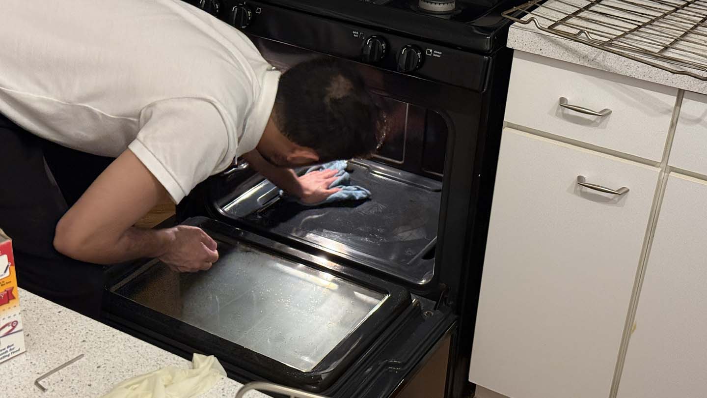 Professional cleaner servicing a Chicago home